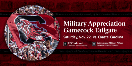A vibrant Gamecock flag featuring a Gamecock logo is waving over a crowd of enthusiastic fans at a football game, while event details for a 'Military Appreciation Gamecock Tailgate' are prominently displayed in the foreground, including the date 'Saturday, Nov. 22' and the opposing team 'Coastal Carolina.' The background features a red brick texture, enhancing the school spirit theme.