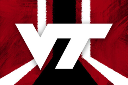 A stylized logo featuring the letters 'VT' in white, set against a dark background with garnet and white abstract brush strokes creating a dynamic backdrop.
