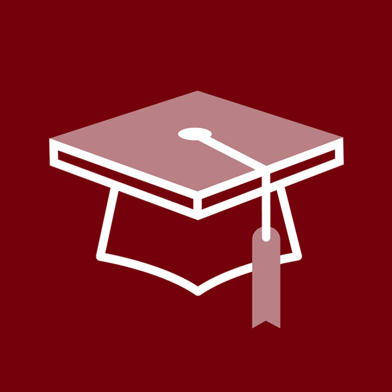 A simple graphic of a graduation cap, colored in shades of garnet, set against a solid garnet background, featuring a white tassel and a tag hanging from the cap's side.