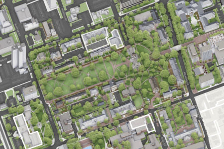 An aerial view of a city block layout featuring buildings, roads, and green spaces, with pathways winding through a central park area, surrounded by architecture and trees.